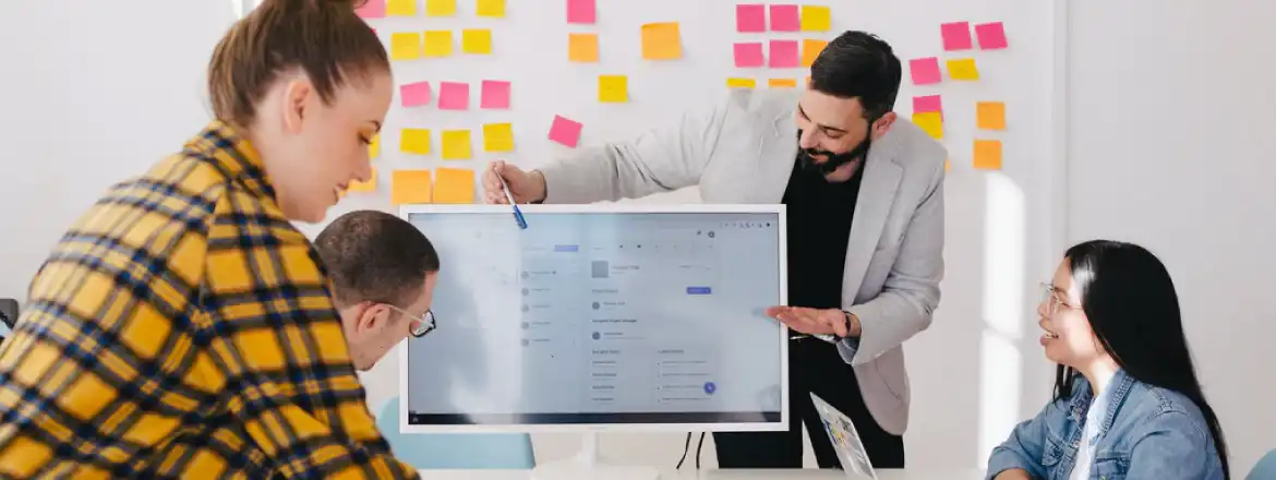 image of a man showing marketing strategy on a chart board