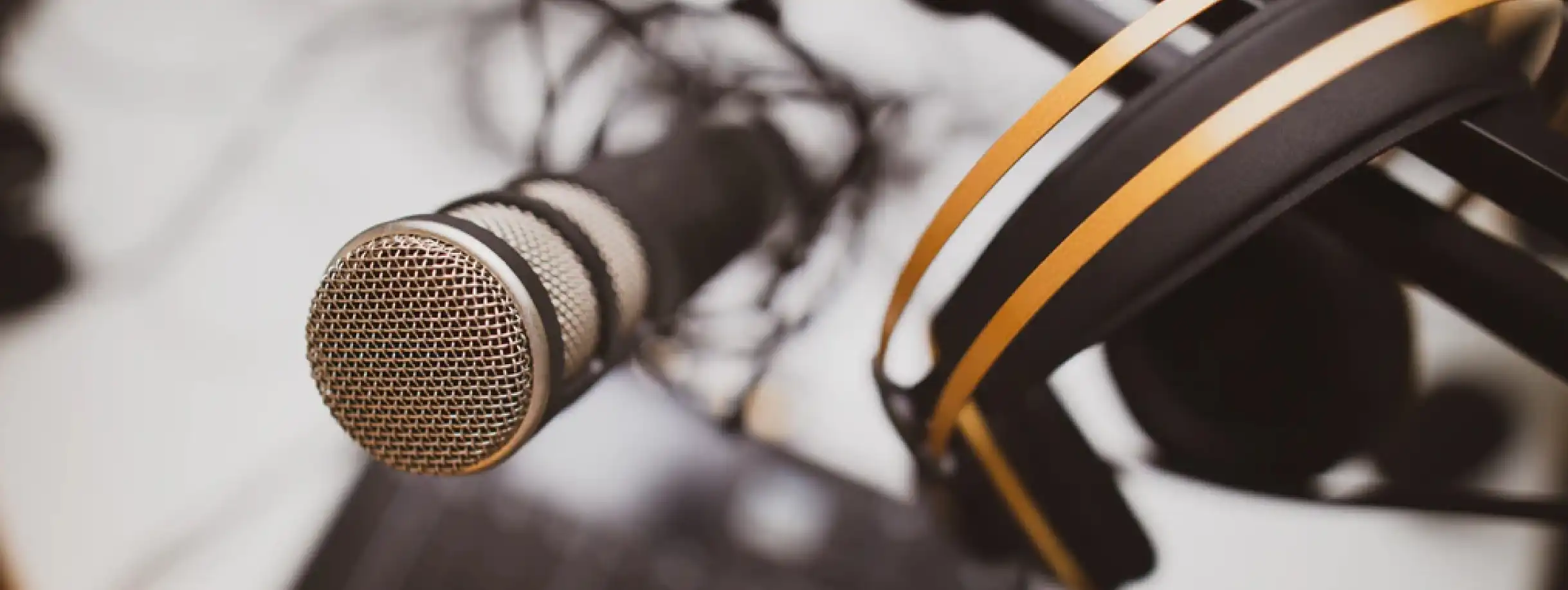 microphone with sound mark in the background