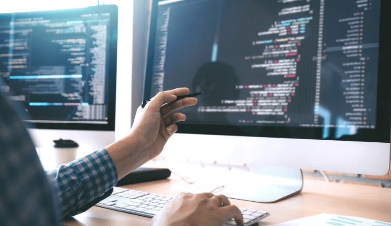 image of a person creating digital models on his system