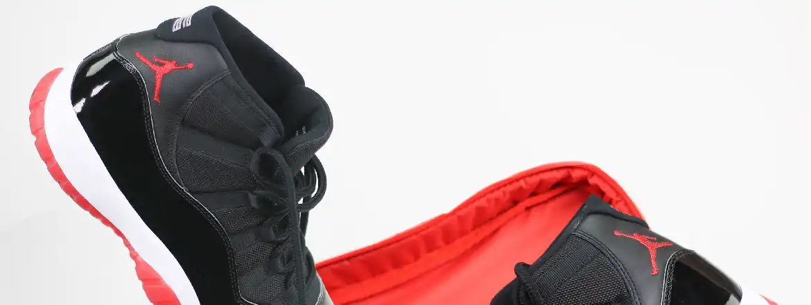 image showing air jordan shoes in black red and white