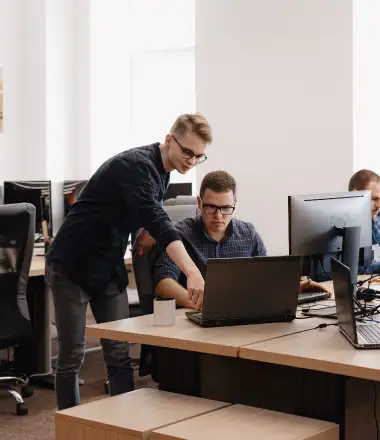 image of a millennial ceo giving social awareness tips to his junior