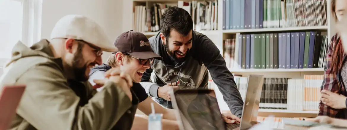 a group of young people discussing startup guide for millennials