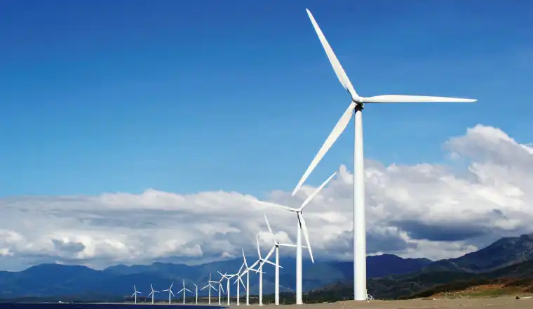 image showing windmills and clear skies